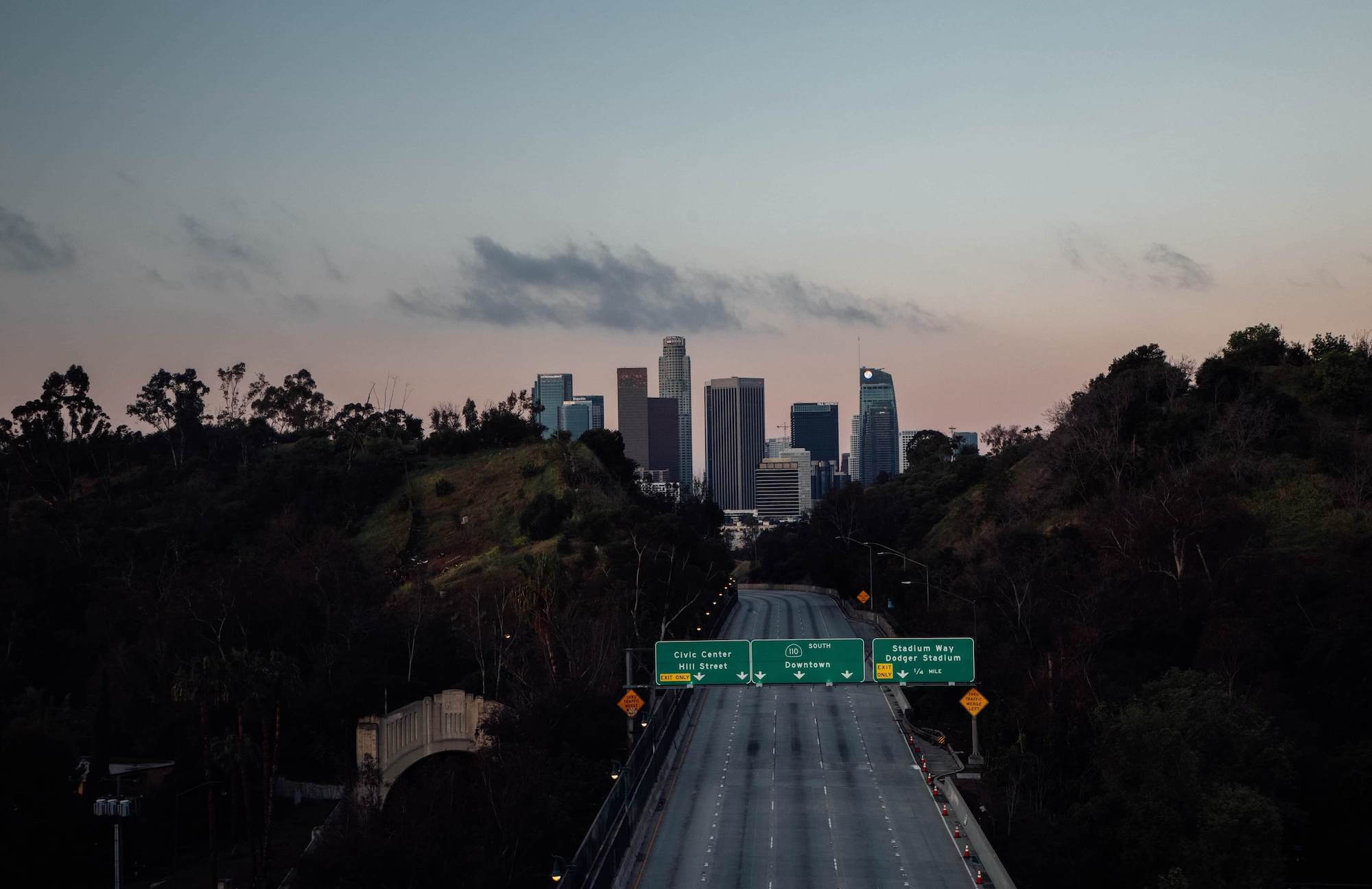 Photo of Los Angeles freeway with buildings in the distance // Drew Tilk / unsplash.com
